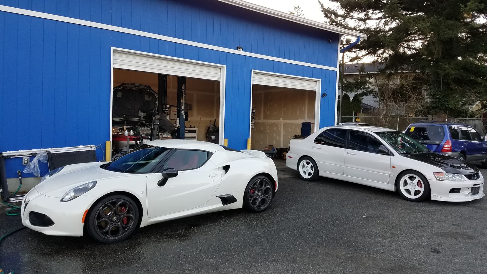 Our shop on Evergreen Way at the end of the day, both bay doors open